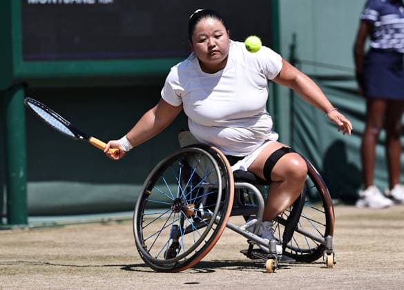 LONDON, ENGLAND - JULY 11: Wang Ziying of China competes against Kgothatso Montjane of South Africa during the Ladies Wheelchair Singles Semifinal match on day twelve of 2025 Wimbledon Championships at All England Lawn Tennis and Croquet Club on July 11, 2025 in London, England.  Copyright: xVCGx 111579023615
