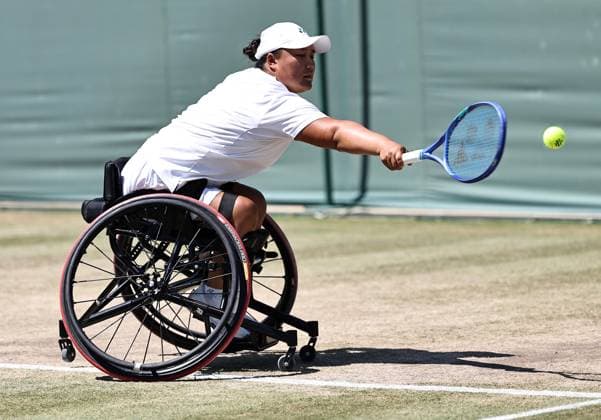 LONDON, ENGLAND - JULY 11: Li Xiaohui of China competes against Yui Kamiji of Japan during the Ladies Wheelchair Singles Semifinal match on day twelve of 2025 Wimbledon Championships at All England Lawn Tennis and Croquet Club on July 11, 2025 in London, England.  Copyright: xVCGx 111579025941