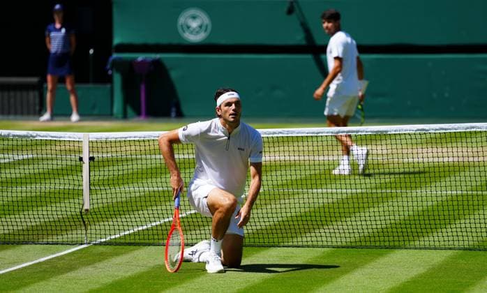 Carlos Alcaraz looks back after a fall from Taylor Fritz Wimbledon Tennis Championships, Day 12, The All England Lawn Tennis and Croquet Club, London, UK - 11 Jul 2025London The All England Lawn Tennis and United Kingdom  Copyright: xJavierxGarcia Shutterstockx 15392287gt