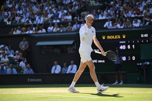 (250712) -- LONDON, July 12, 2025 -- Jannik Sinner celebrates scoring during the men s singles semifinal match between Jannik Sinner of Italy and Novak Djokovic of Serbia at the Wimbledon Tennis Championships in London, Britain, July 11, 2025. ) (SP)BRITAIN-LONDON-TENNIS-WIMBLEDON-MEN S SINGLES ZhaoxDingzhe 