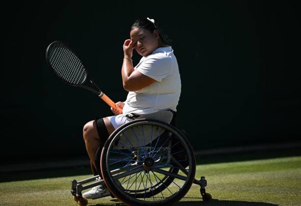 (250712) -- LONDON, July 12, 2025 -- Wang Ziying reacts during the women s wheelchair singles final between Wang Ziying of China and Kamiji Yui of Japan at the Wimbledon Tennis Championships in London, Britain, July 12, 2025. ) (SP)BRITAIN-LONDON-WHEELCHAIR TENNIS-WIMBLEDON-WOMEN S SINGLES-FINAL LixYing 