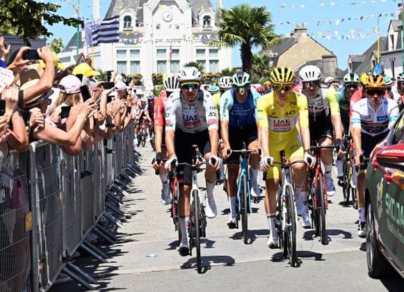 Slovenian Tadej Pogacar of UAE Team Emirates and Belgian Remco Evenepoel of Soudal Quick-Step pictured at the start of stage eight of the 2025 Tour de France cycling, from Saint-Meen-le-Grand to Laval Espace Mayenne (174 km), on Saturday 12 July 2025 in France. The 112th edition of the Tour de France starts on Saturday 5 July in Lille, France, and will finish in Paris, France on the 27th of July. POOLxxPOOLxPETExGODING  x128962268x