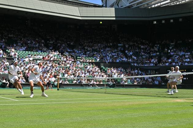 Wimbledon Tennis Championships - Day 13 LONDON, UNITED KINGDOM - JULY 12: Rinky Hijikata of Australia and David Pel of the Netherlands in action against Julian Cash and Lloyd Glasspool of United Kingdom during Championships Wimbledon 2025 Men’s Doubles final tennis match at All England Lawn Tennis and Croquet Club in London, United Kingdom on July 12, 2025. Ray Tang Anadolu London United Kingdom. Editorial use only. Please get in touch for any other usage.  Copyright: x2025xAnadoluxRayxTangx