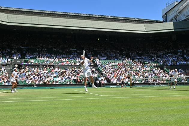 Wimbledon Tennis Championships - Day 13 LONDON, UNITED KINGDOM - JULY 12: Rinky Hijikata of Australia and David Pel of the Netherlands in action against Julian Cash and Lloyd Glasspool of United Kingdom during Championships Wimbledon 2025 Men’s Doubles final tennis match at All England Lawn Tennis and Croquet Club in London, United Kingdom on July 12, 2025. Ray Tang Anadolu London United Kingdom. Editorial use only. Please get in touch for any other usage.  Copyright: x2025xAnadoluxRayxTangx