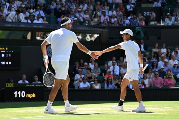 (250712) -- LONDON, July 12, 2025 -- Rinky Hijikata David Pel (L) react during the men s doubles final between Rinky Hijikata (Australia) David Pel (the Netherlands) and Julian Cash Lloyd Glasspool of Britain at the Wimbledon Tennis Championships in London, Britain, July 12, 2025. ) (SP)BRITAIN-LONDON-TENNIS-WIMBLEDON-MEN S DOUBLES-FINAL ZhaoxDingzhe 