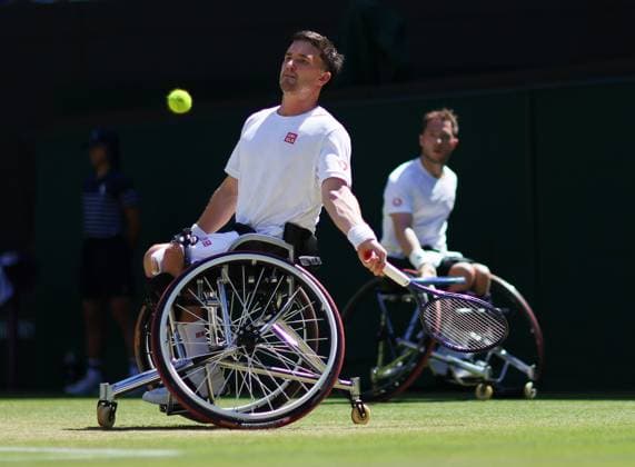 Wimbledon Championships 2025 AELTC, Day Thirteen, London, UK - 12 07 2025 Gordon Reid (GBR) partnered Alfie Hewett (GBR) in action during the Mens Wheelchair DoublesFinal against Martin De La Puente (ESP) and Ruben Spaargaren (NED) in the 2025 Wimbledon Championships London Wimbledon London GBR, UK NEWSPAPERS OUT Copyright: xMarkxGreenwoodx