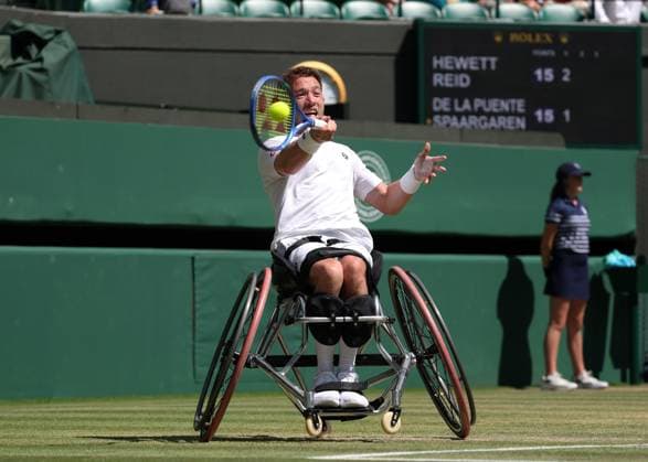 12th July 2025; All England Lawn Tennis and Croquet Club, London, England; Wimbledon Tennis Tournament, Day 13; Alfie Hewett (GBR) with a forehand shot to Ruben Spaargaren (NED) in their men s wheelchair doubles final  ActionPlus12812518 JohnxPatrickxFletcher