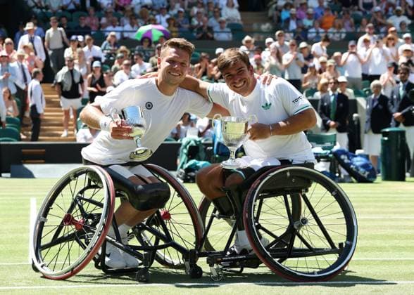 12th July 2025; All England Lawn Tennis and Croquet Club, London, England; Wimbledon Tennis Tournament, Day 13; Martin De La Puente (ESP) and Ruben Spaargaren (NED) pose with the Gentlemen& x2019;s Wheelchair trophy after defeating Alfie Hewett (GBR) and Gordon Reid (GBR) on Court Number One in their men s wheelchair doubles final  ActionPlus12812527 JohnxPatrickxFletcher