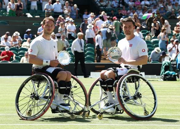 12th July 2025; All England Lawn Tennis and Croquet Club, London, England; Wimbledon Tennis Tournament, Day 13; Alfie Hewett (GBR) and Gordon Reid (GBR) pose with runner-up plates after losing to Martin De La Puente (ESP) and Ruben Spaargaren (NED) in their men s wheelchair doubles final  ActionPlus12812531 JohnxPatrickxFletcher