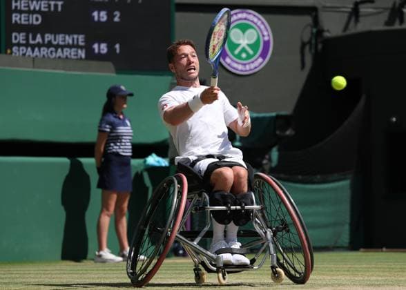 12th July 2025; All England Lawn Tennis and Croquet Club, London, England; Wimbledon Tennis Tournament, Day 13; Alfie Hewett (GBR) with a forehand shot to Ruben Spaargaren (NED) in their men s wheelchair doubles final  ActionPlus12812516 JohnxPatrickxFletcher
