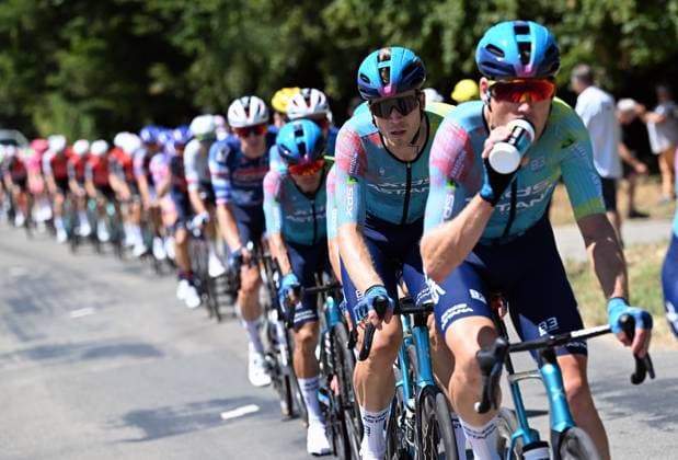 The pack of riders pictured in action during stage eight of the 2025 Tour de France cycling, from Saint-Meen-le-Grand to Laval Espace Mayenne (174 km), on Saturday 12 July 2025 in France. The 112th edition of the Tour de France starts on Saturday 5 July in Lille, France, and will finish in Paris, France on the 27th of July. POOLxxPOOLxPETExGODING  x128975018x