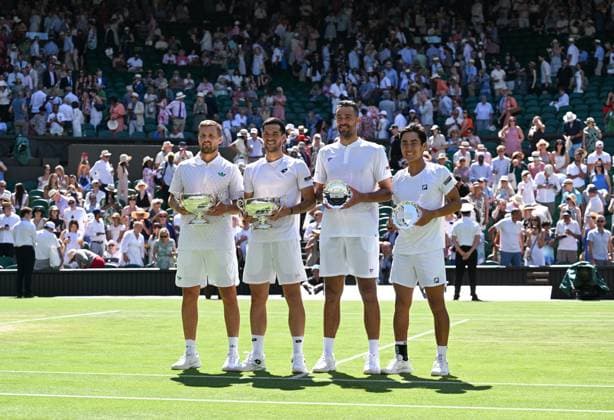 (250712) -- LONDON, July 12, 2025 -- Rinky Hijikata (1st R) David Pel (2nd R) and Julian Cash (2nd L) Lloyd Glasspool pose with their trophies during the awarding ceremony after the men s doubles final between Rinky Hijikata (Australia) David Pel (the Netherlands) and Julian Cash Lloyd Glasspool of Britain at the Wimbledon Tennis Championships in London, Britain, July 12, 2025. ) (SP)BRITAIN-LONDON-TENNIS-WIMBLEDON-MEN S DOUBLES-FINAL ZhaoxDingzhe 