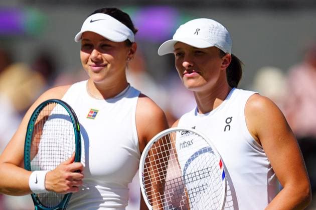 Amanda Anisimova and Iga Swiatek ahead of the Ladies Singles Final Wimbledon Tennis Championships, Day 13, The All England Lawn Tennis and Croquet Club, London, UK - 12 Jul 2025London The All England Lawn Tennis and United Kingdom  Copyright: xJavierxGarcia Shutterstockx 15392293ao