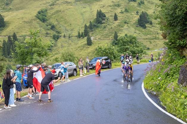 13.07.2025, Feldkirch, AUT, Tour of Austria 2025, Etappe 5 von Feldkirch nach Feldkirch (147,8 km), im Bild Juul Christopher Jensen (DEN, TEAM JAYCO ALULA), Emanuel Zangerle (AUT, TEAM VORARLBERG), Nicolya Vinokurov (KAZ, XDS ASTANA TEAM) mit Fans Anstieg zur Bergwertung am Furkajoch Juul Christopher Jensen (DEN, TEAM JAYCO ALULA), Emanuel Zangerle (AUT, TEAM VORARLBERG), Nicolya Vinokurov (KAZ, XDS ASTANA TEAM) mit Fans Anstieg zur Bergwertung am Furkajoch during the stage 5 from Feldkirch to Feldkirch (147,8 km) of the Tour of Austria. Feldkirch, Austria on 2025 07 13. Expa Feldkirch