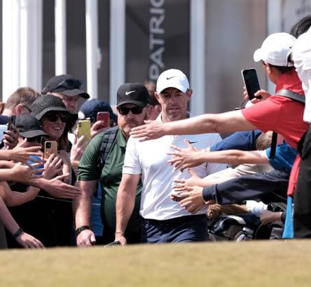 UK: The Genesis Scottish Open at The Renaissance Club, North Berwick, Scotland on 13 July 2025: Pictured: Fans stretch to touch Rory McIlroy (Northern Ireland) as he makes his way to the 1st tee during the final round of the Genesis Scottish Open 2025 at The Renaissance Club, North Berwick, Scotland North Berwick The Renaissance Club Scotland Copyright: xAlexxToddx