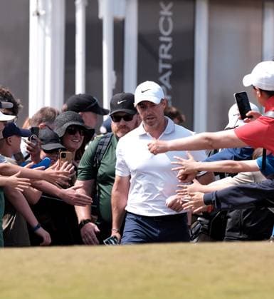UK: The Genesis Scottish Open at The Renaissance Club, North Berwick, Scotland on 13 July 2025: Pictured: Fans stretch to touch Rory McIlroy (Northern Ireland) as he makes his way to the 1st tee during the final round of the Genesis Scottish Open 2025 at The Renaissance Club, North Berwick, Scotland North Berwick The Renaissance Club Scotland Copyright: xAlexxToddx