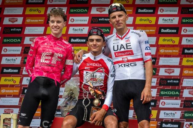 Sport Bilder des Tages CYCLING - Tour of Austria 2025 FELDKIRCH,AUSTRIA,13.JUL.25 - CYCLING - Tour of Austria, stage 5, Feldkirch - Feldkirch. Image shows the podium of the tour 2025: Archie Ryan (IRL EF Education - Easypost), Isaac Del Torro Romero (MEX UAE Team Emirates XRG) and Rafal Majka (POL UAE Team Emirates XRG).  GEPAxpictures xOliverxLerch