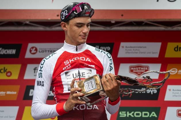 CYCLING - Tour of Austria 2025 FELDKIRCH,AUSTRIA,13.JUL.25 - CYCLING - Tour of Austria, stage 5, Feldkirch - Feldkirch. Image shows Isaac Del Torro Romero (MEX UAE Team Emirates XRG)with the trophy for the overall winner.  GEPAxpictures xOliverxLerch