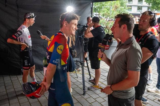 CYCLING - Tour of Austria 2025 FELDKIRCH,AUSTRIA,13.JUL.25 - CYCLING - Tour of Austria, stage 5, Feldkirch - Feldkirch. Image shows Felix Grossschartner (AUT UAE Team Emirates XRG) and Patrick Konrad (AUT LIDL-TREK) in the interview zone.  GEPAxpictures xOliverxLerch