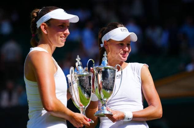 Veronika Kudermetova and Elise Mertens after winning the Ladies Doubles final Wimbledon Tennis Championships, Day 14, The All England Lawn Tennis and Croquet Club, London, UK - 13 Jul 2025London The All England Lawn Tennis and United Kingdom  Copyright: xJavierxGarcia Shutterstockx 15392297bn