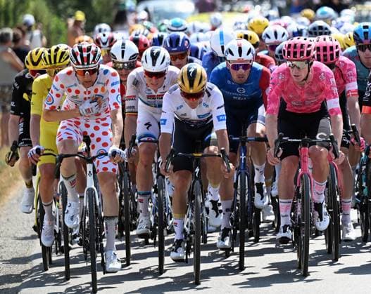 Slovenian Tadej Pogacar of UAE Team Emirates, Belgian Tim Wellens of UAE Team Emirates, Belgian Tim Merlier of Soudal Quick-Step and Belgian Remco Evenepoel of Soudal Quick-Step pictured in action during stage nine of the 2025 Tour de France cycling, from Chinon to Chateauroux (170 km), on Sunday 13 July 2025 in France. The 112th edition of the Tour de France starts on Saturday 5 July in Lille, France, and will finish in Paris, France on the 27th of July. POOLxxPOOLxPETExGODING  x129080965x