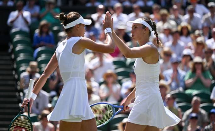 (250713) -- LONDON, July 13, 2025 -- Veronika Kudermetova Elise Mertens (R) celebrate during the women s doubles final between Hsieh Su-Wei (Chinese Taipei) Jelena Ostapenko (Latvia) and Veronika Kudermetova (Russia) Elise Mertens (Belgium) at the Wimbledon Tennis Championships in London, Britain, July 13, 2025. ) (SP)BRITAIN-LONDON-TENNIS-WIMBLEDON-WOMEN S DOUBLES-FINAL LixYing 