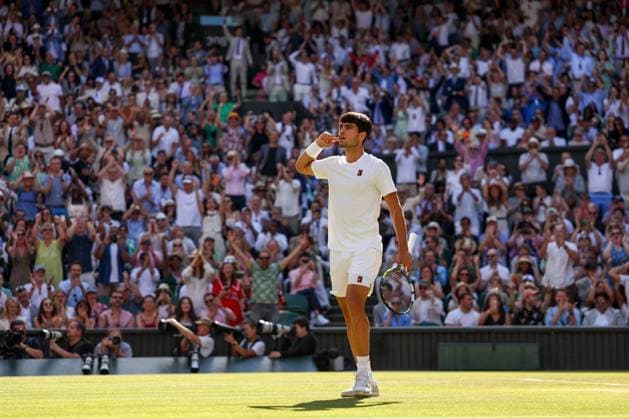 Carlos Alcaraz puts his finger to his ear during the Gentlemen s Singles final Wimbledon Tennis Championships, Day 14, The All England Lawn Tennis and Croquet Club, London, UK - 13 Jul 2025London The All England Lawn Tennis and United Kingdom  Copyright: xEllaxLing Shutterstockx 15392298z