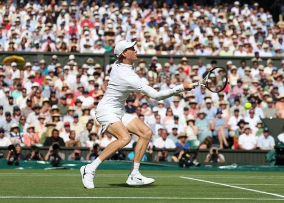 13th July 2025; All England Lawn Tennis and Croquet Club, London, England; Wimbledon Tennis Tournament, Day 14; Jannik Sinner (ITA) with a forehand shot to Carlos Alcaraz (ESP) , mens singles final match  ActionPlus12813412 JohnxPatrickxFletcher