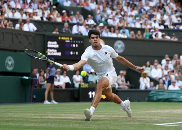 13th July 2025; All England Lawn Tennis and Croquet Club, London, England; Wimbledon Tennis Tournament, Day 14; Carlos Alcaraz (ESP) with a forehand shot to Jannik Sinner (ITA) in the mens singles final  ActionPlus12813430 JohnxPatrickxFletcher