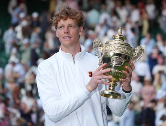 Tennis - 2025 Wimbledon Championships - Mens singles Final - Jannik Sinner (Italy) v Carlos Alcaraz (Spain) All England Lawn Tennis & Croquet Club - Sunday 13th July 2025 Jannik Sinner (Italy) with the trophy 