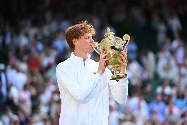 Jannik Sinner Wins His First Wimbledon Trophy - UK Jannik Sinner (ITA) wins his first Wimbledon Trophy at the 2025 Wimbledon Championships at the AELTC in London, UK, on July 13, 2025. Photo by Corinne Dubreuil ABACAPRESS.COM London United Kingdom  Copyright: xDubreuilxCorinne ABACAx