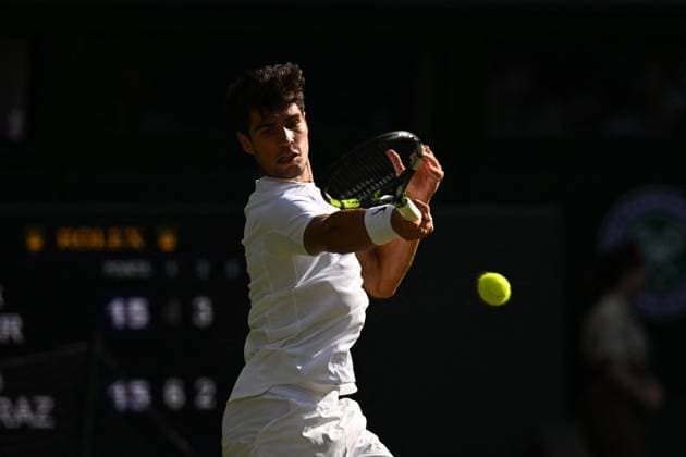Jannik Sinner Wins His First Wimbledon Trophy - UK Carlos Alcaraz (ESP) during the men final at the 2025 Wimbledon Championships at the AELTC in London, UK, on July 13, 2025. Photo by Corinne Dubreuil ABACAPRESS.COM London United Kingdom  Copyright: xDubreuilxCorinne ABACAx