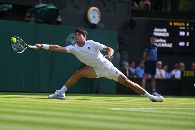 Jannik Sinner Wins His First Wimbledon Trophy - UK Carlos Alcaraz (ESP) during the men final at the 2025 Wimbledon Championships at the AELTC in London, UK, on July 13, 2025. Photo by Corinne Dubreuil ABACAPRESS.COM London United Kingdom  Copyright: xDubreuilxCorinne ABACAx