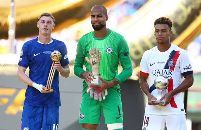 Chelsea s Cole Palmer (L) holds his trophy for best player of the tournament, Chelsea s Robert Sanchez (C) holds his Golden Gloves trophy and Paris St Germain s Desire Doue poses with the young player of the tournament trophy after Chelsea defeated Paris Saint-Germain 3-0 in the 2025 FIFA Club World Cup Final match at MetLife Stadium in East Rutherford, New Jersey on Sunday, July 13, 2025.  NYP20250713242 CHRISTIANxBRUNSKILL