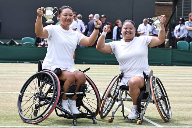 Li Xiaohui and Wang Ziying, CHN, after wheelchair doubles final at 2025 All England Lawn Tennis Championships in Wimbledon, London, 13 07 2025; -