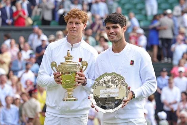 Jannik Sinner, ITA, and Carlos Alcaraz, ESP, after final of 2025 All England Lawn Tennis Championships at Wimbledon, mens singles, London, 13 07 2025; -