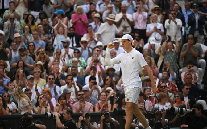(250714) -- LONDON, July 14, 2025 -- Jannik Sinner celebrates scoring during the men s singles final between Carlos Alcaraz of Spain and Jannik Sinner of Italy at the Wimbledon Tennis Championships in London, Britain, July 13, 2025. ) (SP)BRITAIN-LONDON-TENNIS-WIMBLEDON-MEN S SINGLES-FINAL LixYing 