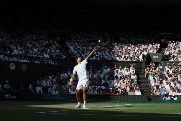 13th July 2025; All England Lawn Tennis and Croquet Club, London, England; Wimbledon Tennis Tournament, Day 14; Carlos Alcaraz (ESP) serves to Jannik Sinner (ITA) during the Gentlemen s singles final match  ActionPlus12813538 JohnxPatrickxFletcher