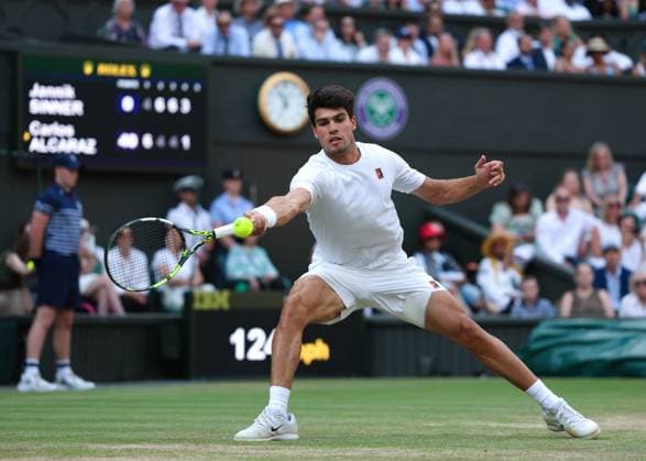 13th July 2025; All England Lawn Tennis and Croquet Club, London, England; Wimbledon Tennis Tournament, Day 14; Carlos Alcaraz (ESP) with a forehand shot to Jannik Sinner (ITA) during the Gentlemen s singles final match  ActionPlus12813526 JohnxPatrickxFletcher