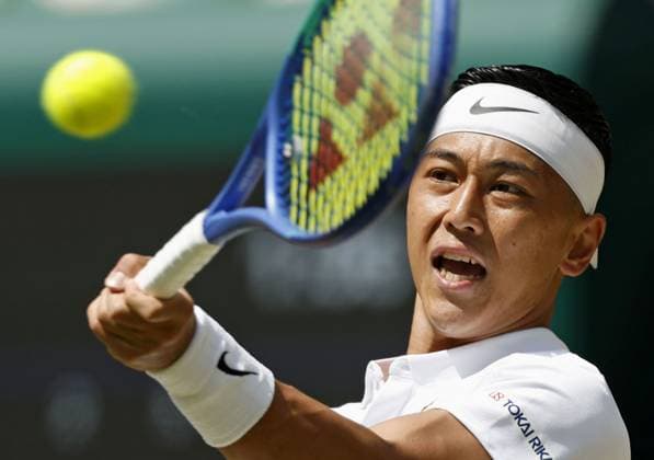 Tennis: Wimbledon championships Tokito Oda of Japan plays against Alfie Hewett of Britain in the men s wheelchair singles final at the Wimbledon tennis tournament in London on July 13, 2025.  A14AA0004721908P