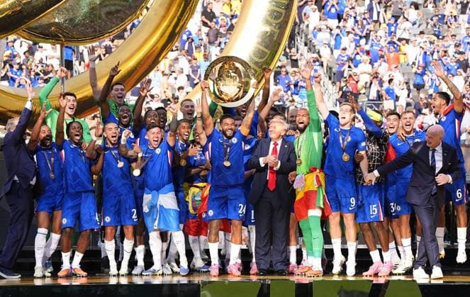Football: Club World Cup Chelsea players celebrate, as U.S. President Donald Trump (C, R) looks on, after beating Paris Saint-Germain in the Club World Cup final at MetLife Stadium in East Rutherford, New Jersey, on July 13, 2025.  A14AA0004722124P