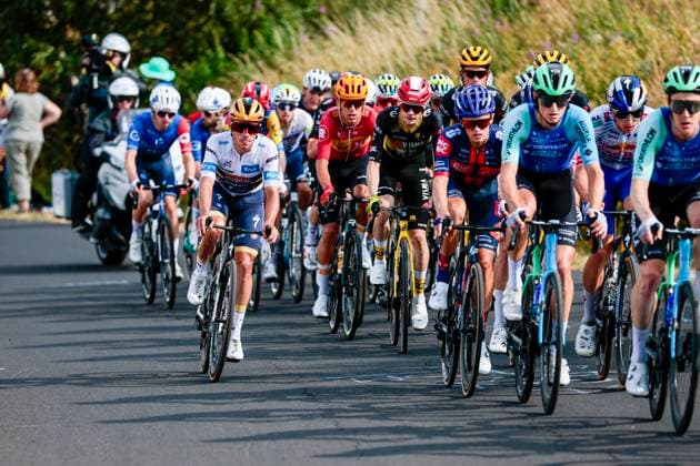 Tour de France 2025 Stage 10 LE MONT-DORE PUY DE SANCY, FRANCE - JULY 14 : Evenepoel Remco (BEL) of Soudal - Quick Step in action during stage 10 of the 112th edition of Tour de France an UCI World Tour 2.UWT cycling road race stage for Men Elite of 163 km with start in Ennezat and finish in Le Mont-Dore Puy de Sancy on July 14, 2025 in Le Mont-Dore Puy de Sancy, France, 14 07 2025 ( Motordriver Kenny Verfaillie - Le Mont-Dore Puy de Sancy France  Copyright: xLucaxBettinix