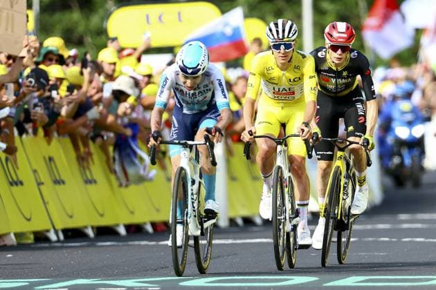 French Lenny Martinez of Bahrain Victorious, Slovenian Tadej Pogacar of UAE Team Emirates and Danish Jonas Vingegaard Hansen of Team Visma-Lease a Bike pictured in action during stage 10 of the 2025 Tour de France cycling, from Ennezat to Le Mont-Dore Puy de Sancy (169 km), on Monday 14 July 2025 in France. The 112th edition of the Tour de France starts on Saturday 5 July in Lille, France, and will finish in Paris, France on the 27th of July. DAVIDxPINTENS  x129256725x