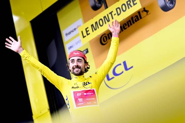 Irish Ben Healy of EF Education-EasyPost celebrates on the podium in the yellow jersey of leader in the overall ranking after stage 10 of the 2025 Tour de France cycling, from Ennezat to Le Mont-Dore Puy de Sancy (169 km), on Monday 14 July 2025 in France. The 112th edition of the Tour de France starts on Saturday 5 July in Lille, France, and will finish in Paris, France on the 27th of July. JASPERxJACOBS  x129257042x