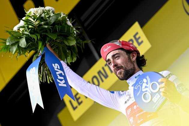Irish Ben Healy of EF Education-EasyPost celebrates on the podium in the white jersey for best young rider after stage 10 of the 2025 Tour de France cycling, from Ennezat to Le Mont-Dore Puy de Sancy (169 km), on Monday 14 July 2025 in France. The 112th edition of the Tour de France starts on Saturday 5 July in Lille, France, and will finish in Paris, France on the 27th of July. JASPERxJACOBS  x129258873x