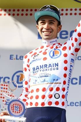 French Lenny Martinez of Bahrain-Victorious celebrates on the podium in the red polka-dot jersey for best climber after stage 10 of the 2025 Tour de France cycling, from Ennezat to Le Mont-Dore Puy de Sancy (169 km), on Monday 14 July 2025 in France. The 112th edition of the Tour de France starts on Saturday 5 July in Lille, France, and will finish in Paris, France on the 27th of July. DAVIDxPINTENS  x129259198x