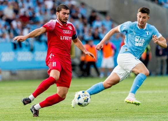 250715 Gizo Mamageishvili of FC Iberia and Lasse Berg Johnsen of Malmö FF during the UEFA Champions League qualifier football match between Malmö FF and FC Iberia 1999 on July 15, 2025 in Malmö. Photo: Christian Örnberg BILDBYRAN COP 166 CO0587 fotboll, football, soccer, fotball,uefa champions league gualifi Copyright: CHRISTIANxÖRNBERG BB250715CO026