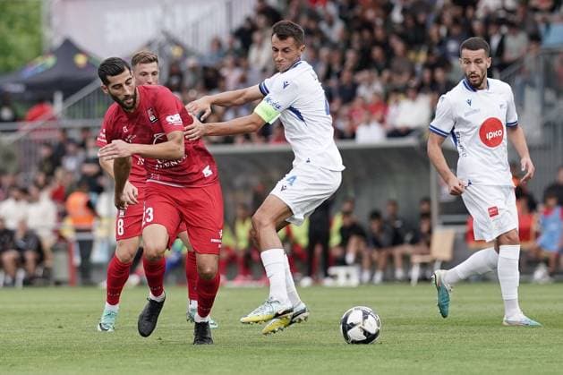 Fussball Champions League 2025 - 2026 15.07.2025, Fussball Champions League, UEFA Champions League, 2025-2026, Qualification Round 1, Luxembourg, Stade Municipal, Luxemburg (LUX) - FC Differdange 03 (LUX) - FC Drita (RKS) vl: Samir Hadji (FC Differdange 03 23) - Rron Broja (Drita 4)