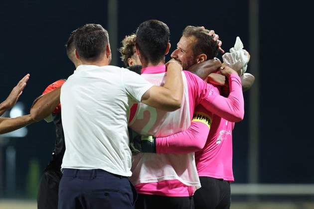 Henry Bonello, goalkeeper of Hamrun Spartans is mobbed by team mates after his team™s victory after the UEFA Champions League First qualifying round, 2nd leg soccer match between Hamrun Spartans FC and FK Zalgiris at the Centenary Stadium, in Ta Qali, Malta, 15 July 2025. UEFA Champions League - Hamrun Spartans FC v FK Zalgiris