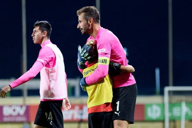 Henry Bonello (right), goalkeeper of Hamrun Spartans reacts in celebration with a ball boy after his team™s triumph in the UEFA Champions League First qualifying round, 2nd leg soccer match between Hamrun Spartans FC and FK Zalgiris at the Centenary Stadium, in Ta Qali, Malta, 15 July 2025. Hamrun Spartans became the first Maltese soccer team to advance to the UEFA Champions League Second qualifying round. UEFA Champions League - Hamrun Spartans FC v FK Zalgiris